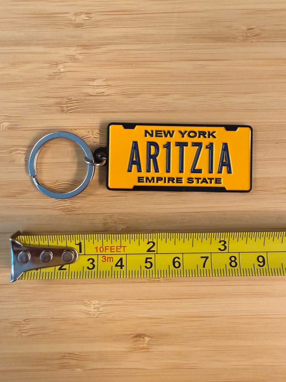Aritzia Black Logo Keychain with Silver Ring NEVER USED